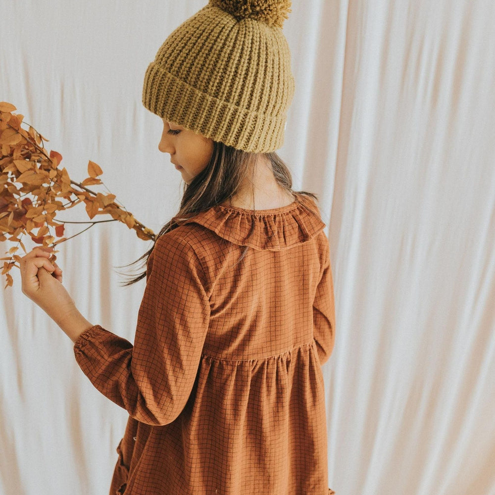 
                      
                        Pom Pom Knit Hat
                      
                    