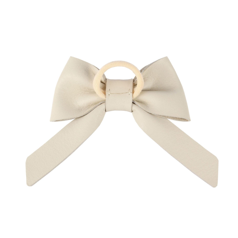 
                      
                        Cinty Hair Tie - Cream Leather
                      
                    